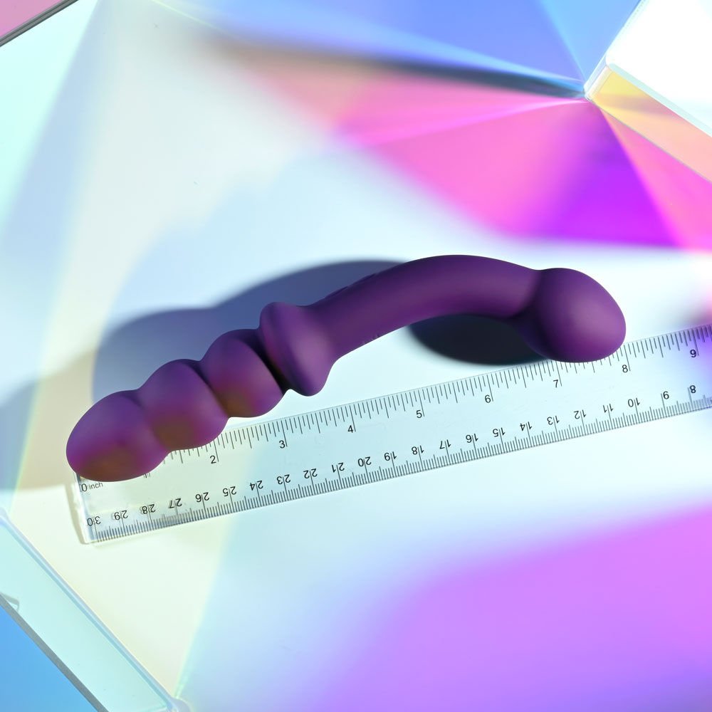 Playboy - pleasure the seeker - double-ended toys - Product top view, in a hand  | Flirtybay.com.au